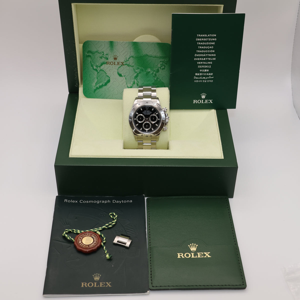 Rolex Daytona Black Dial 116520 - 2004 - Original Warranty Papers